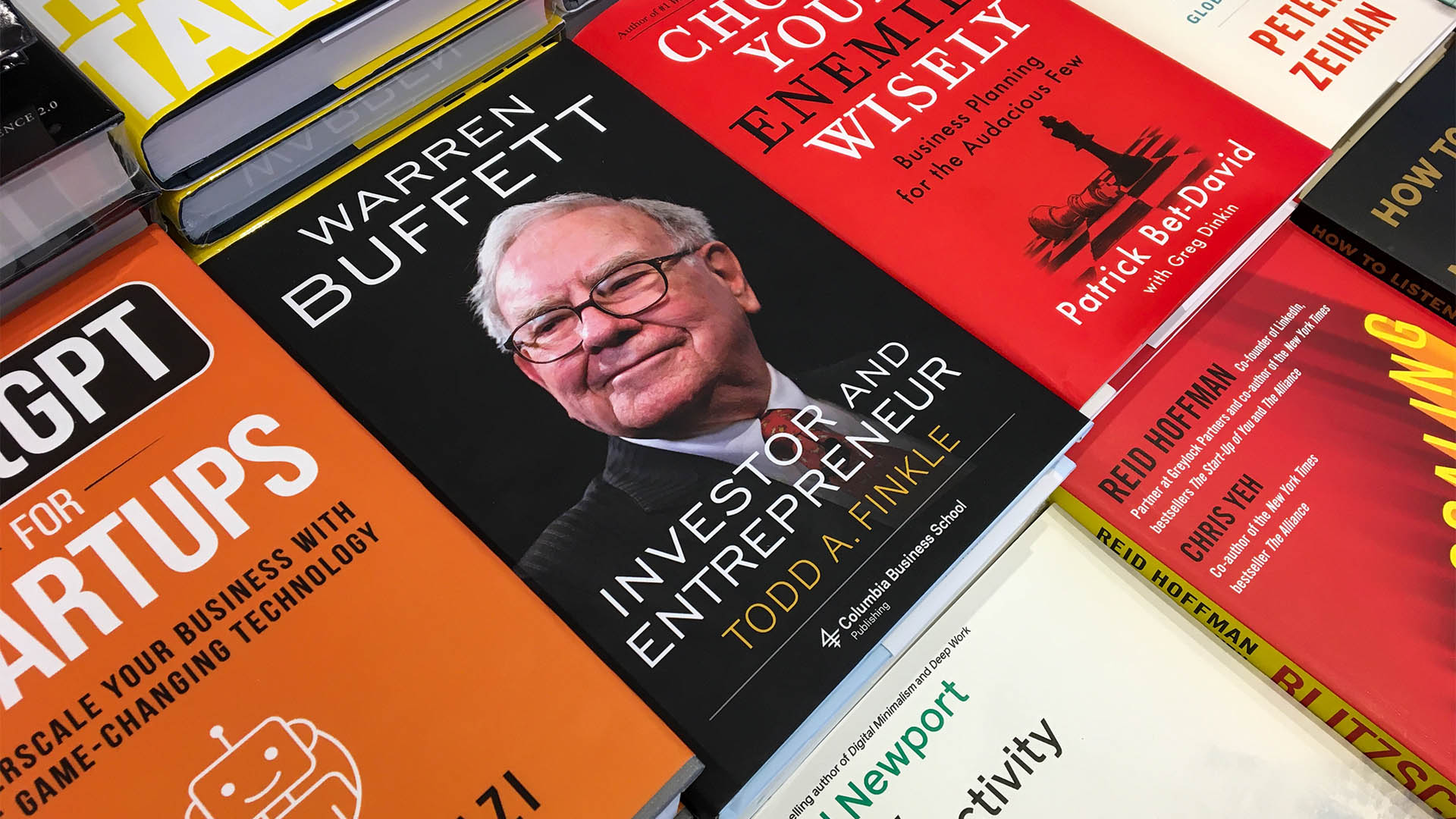 Dubai, UAE - April 21, 2024: Close-up Todd A. Finkle's Warren Buffett: Investor and Entrepreneur book in the bookshop.