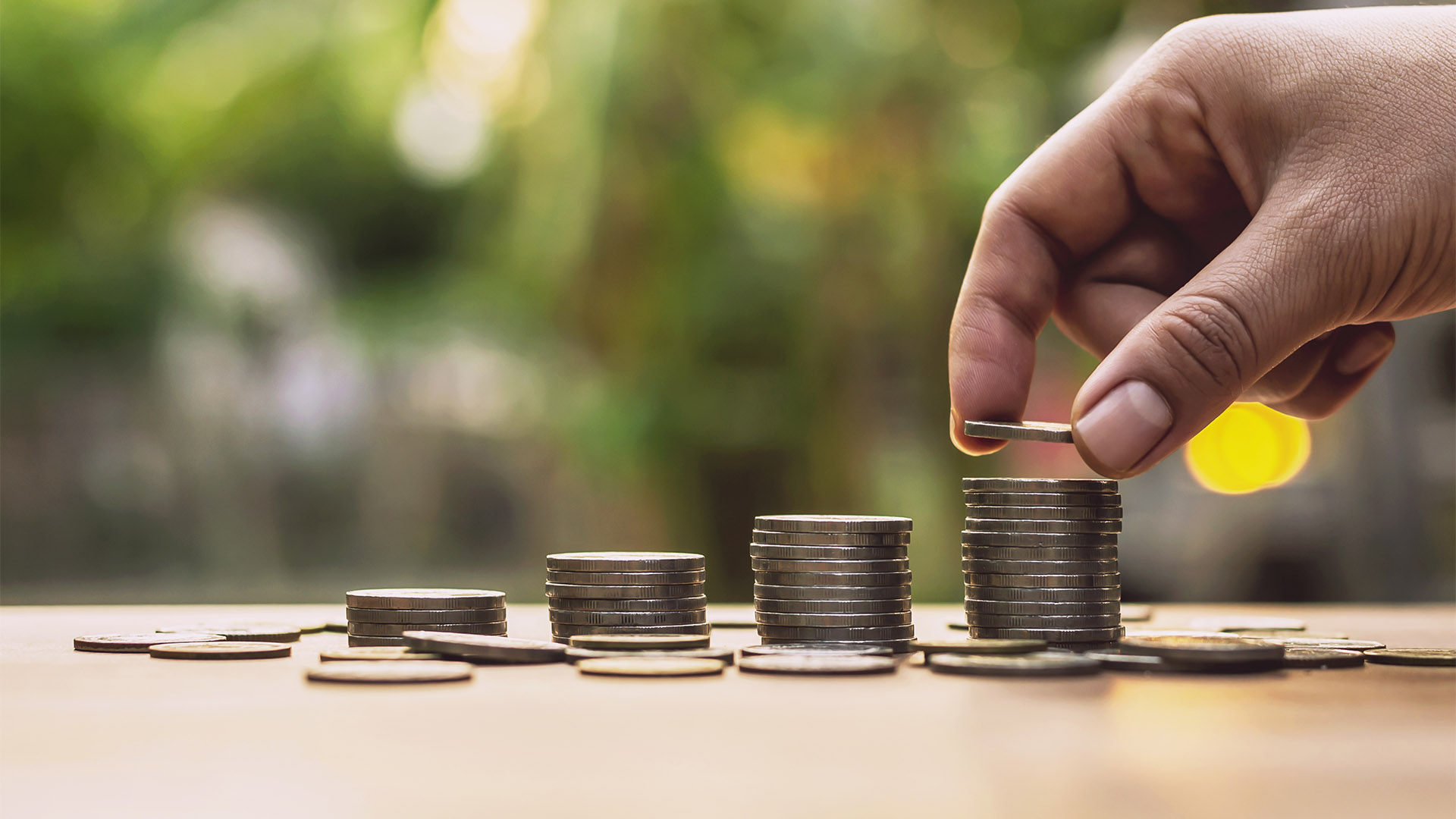 Placing the coin as a step Investment concepts and saving Growing business