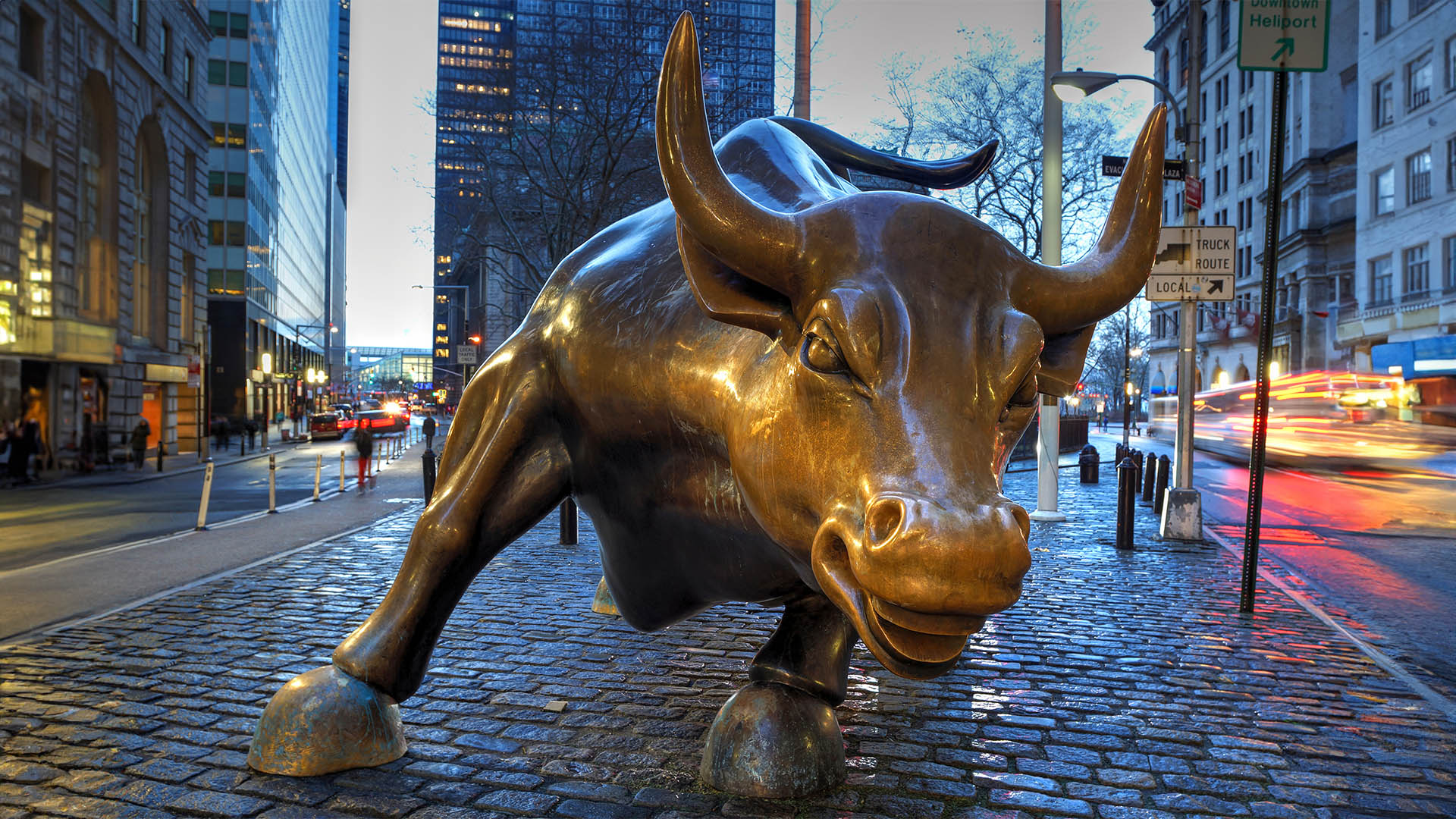 Manhattan, New York, USA - January 11, 2017:  Charging Bull (Wall Street Bull).  Early in the Morning.