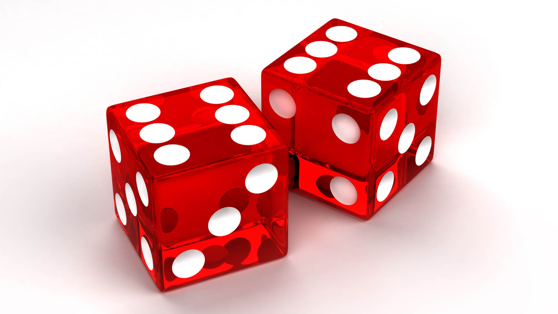 Two red glass dices rendered on the white background
