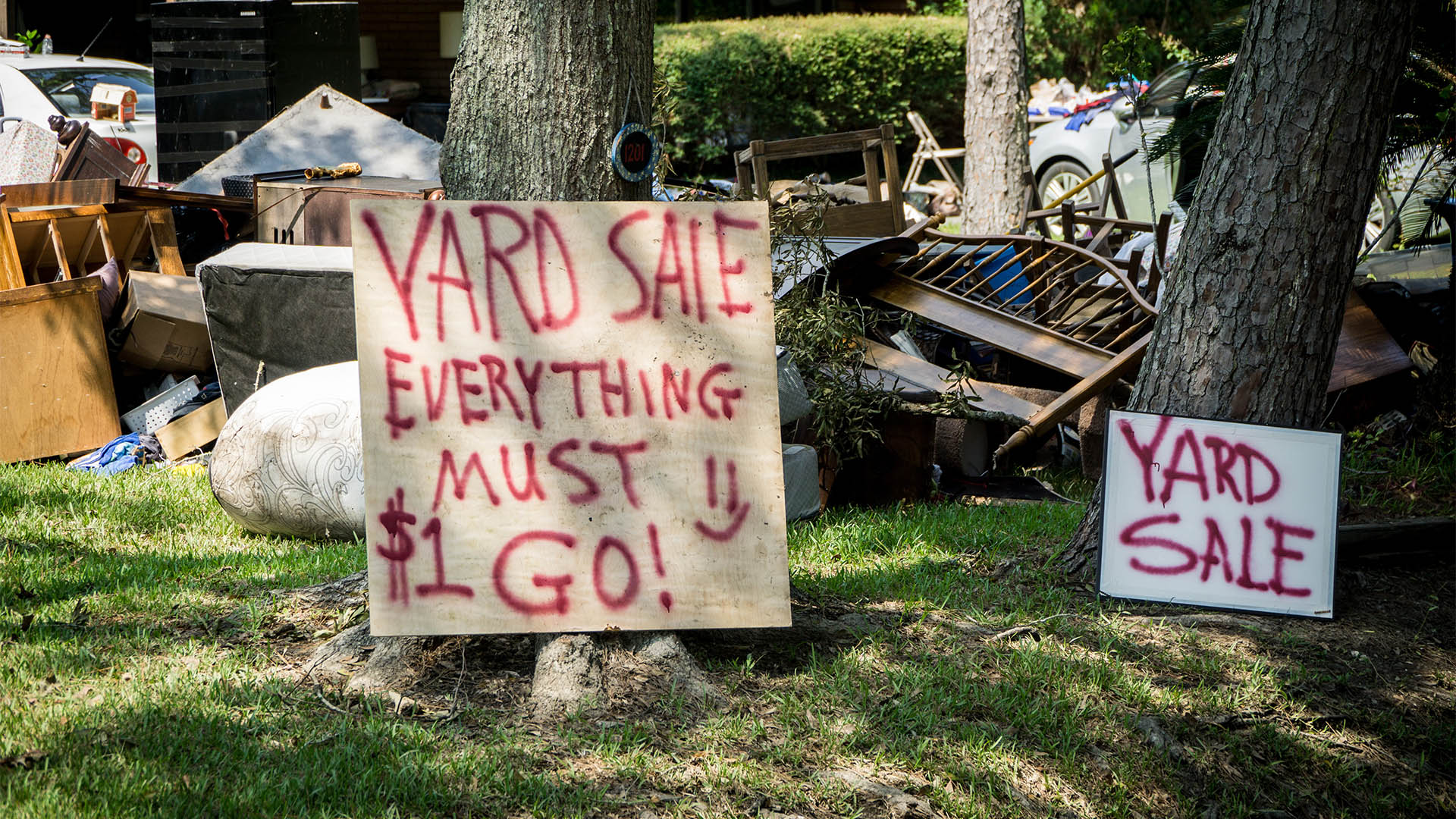 Everything must go yard sale in front of a Houston home devastated by Hurricane Harvey