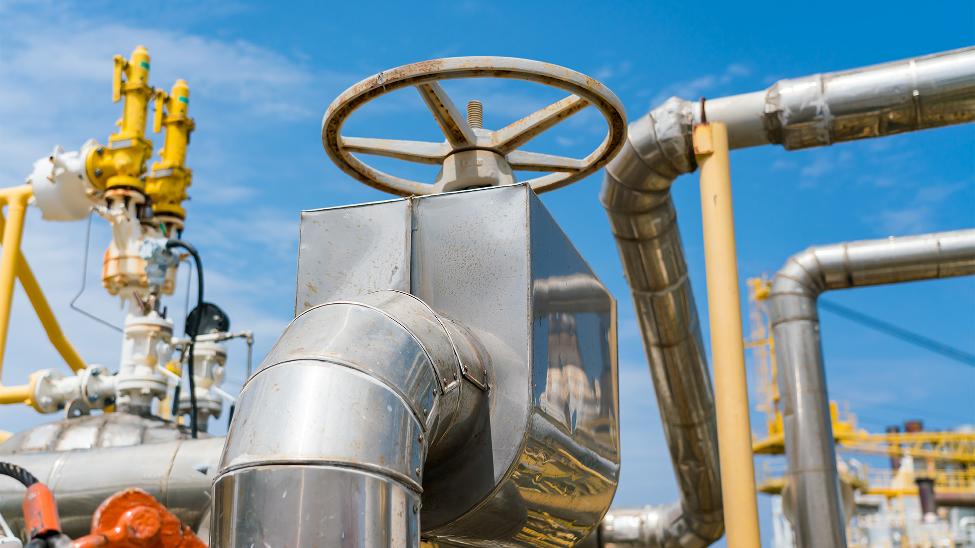 Insulation foam covered with a good waterproof rubber sheet on pipes in offshore oil and gas processing.