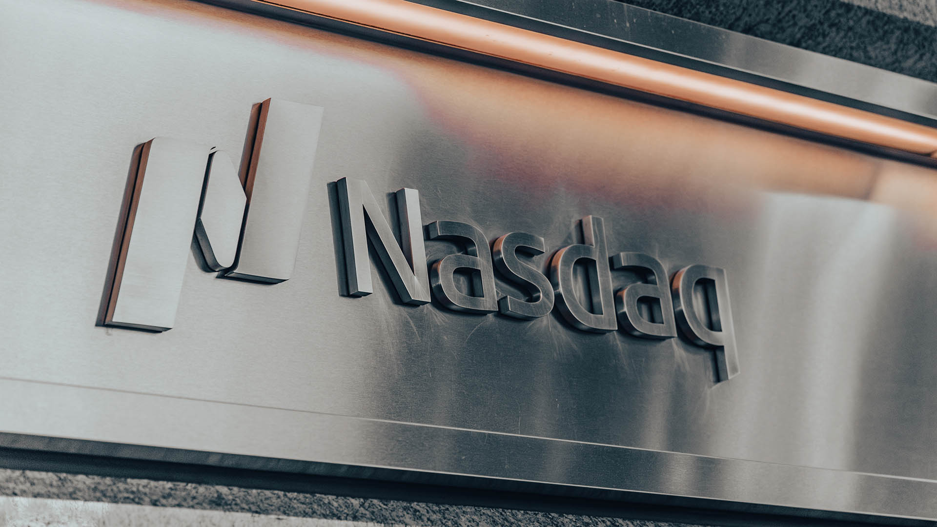 New York, US - May 7, 2023 - Nasdaq logo in neon light of Times Square