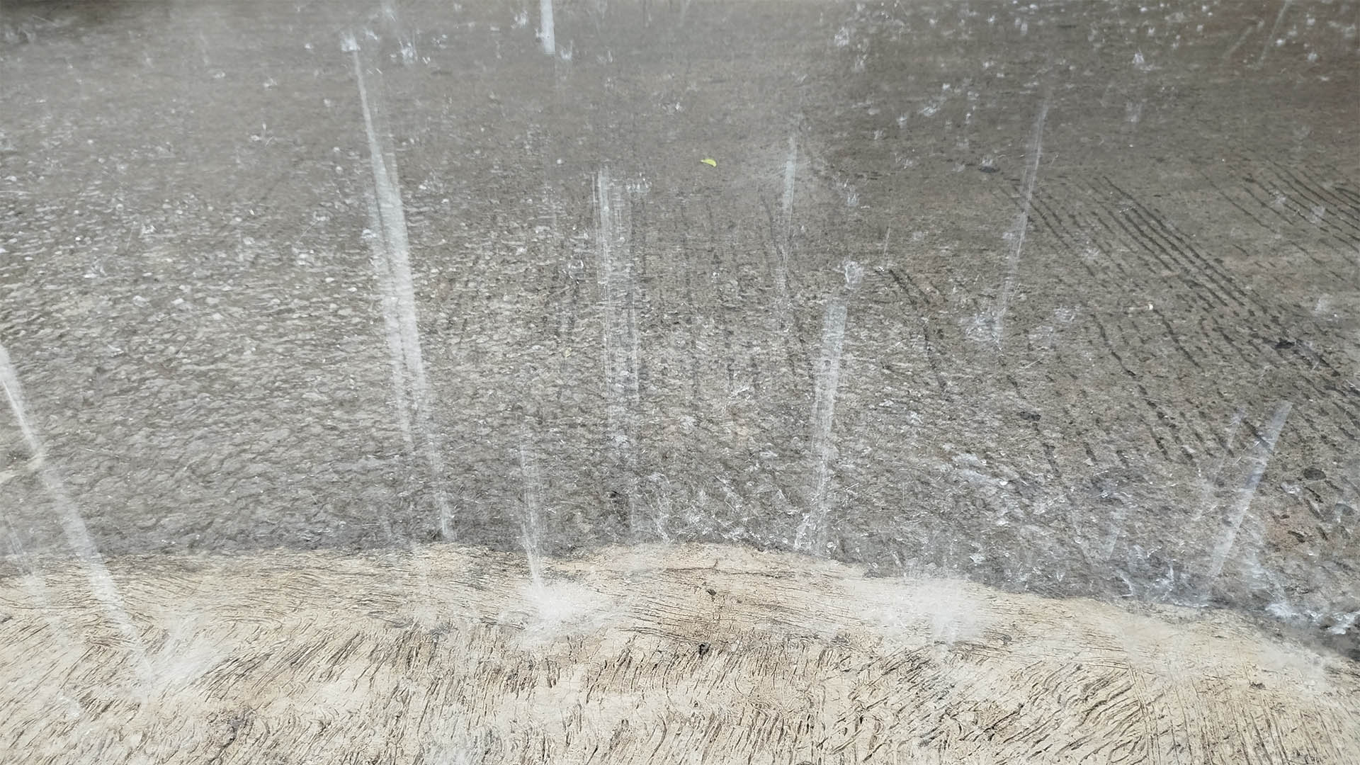Epic water falls from the roof in the hard rain