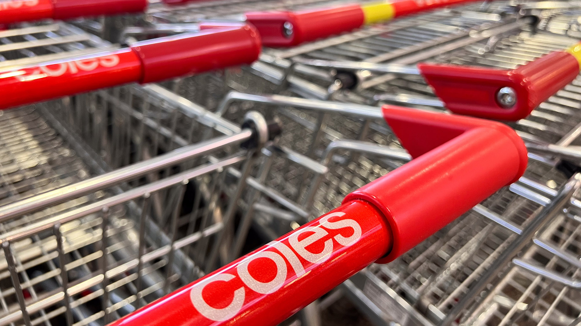 BRISBANE - MAR 01 2024: Coles supermarket shopping carts..Australian Supermarkets are on the front line of consumer concerns about the rising cost of living increasing hostilities from customers.