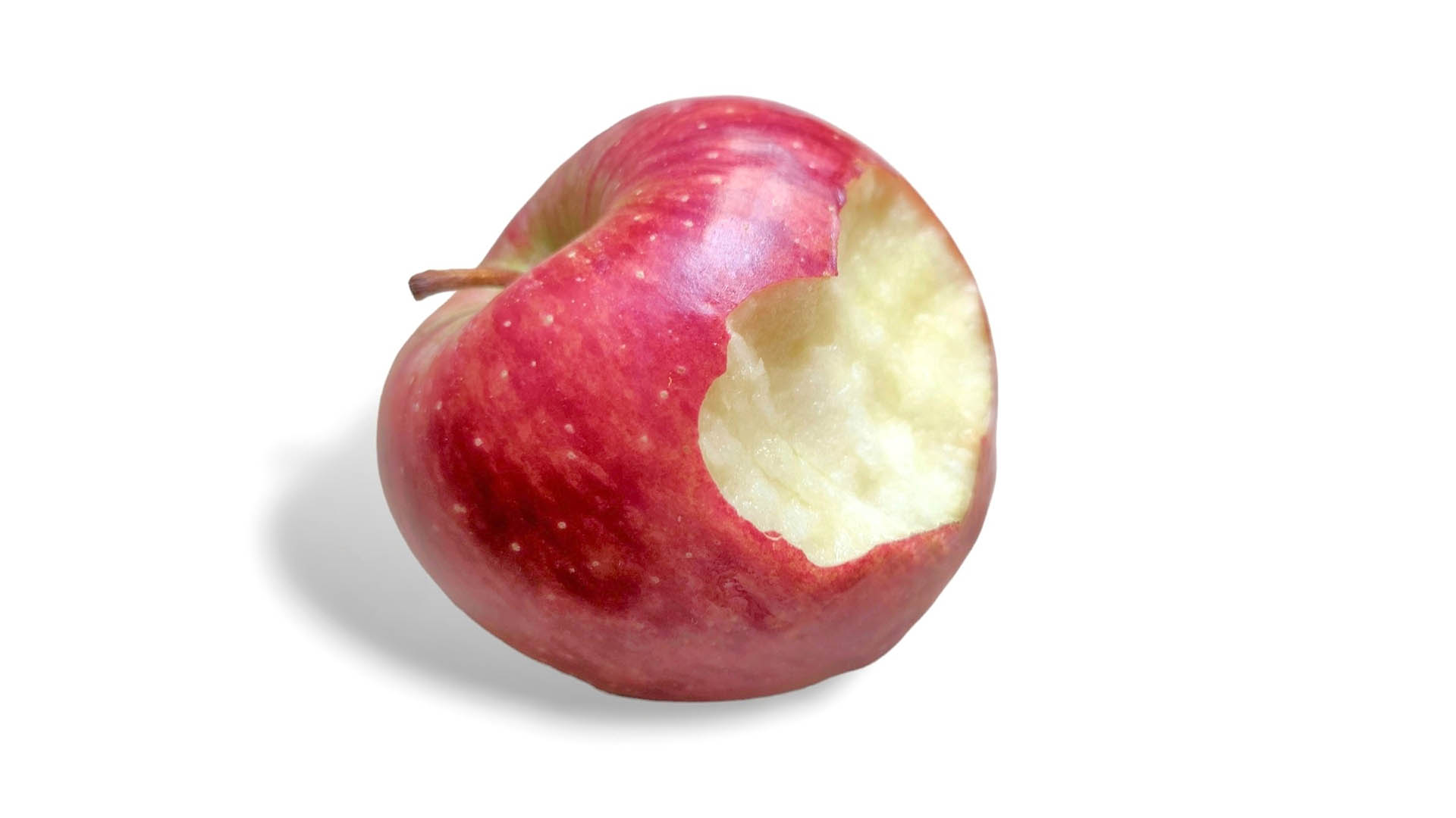 Photo of a delicious bitten apple, isolated on white background.