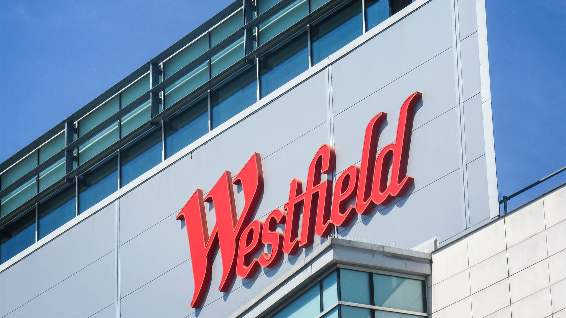 SHEPHERDS BUSH, LONDON- JUNE 2018:    Westfield Shopping Centre signage logo. Large-scale indoor retail centre with many high street and luxury brand