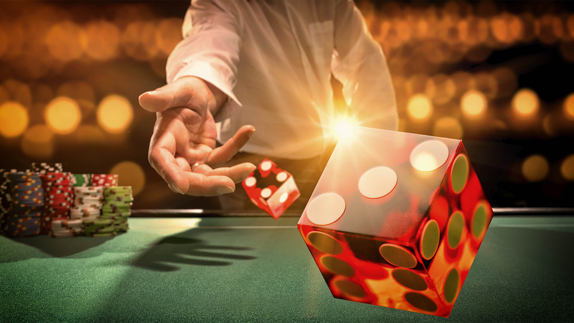 Man gambling at the craps table at the casino - Selective focus