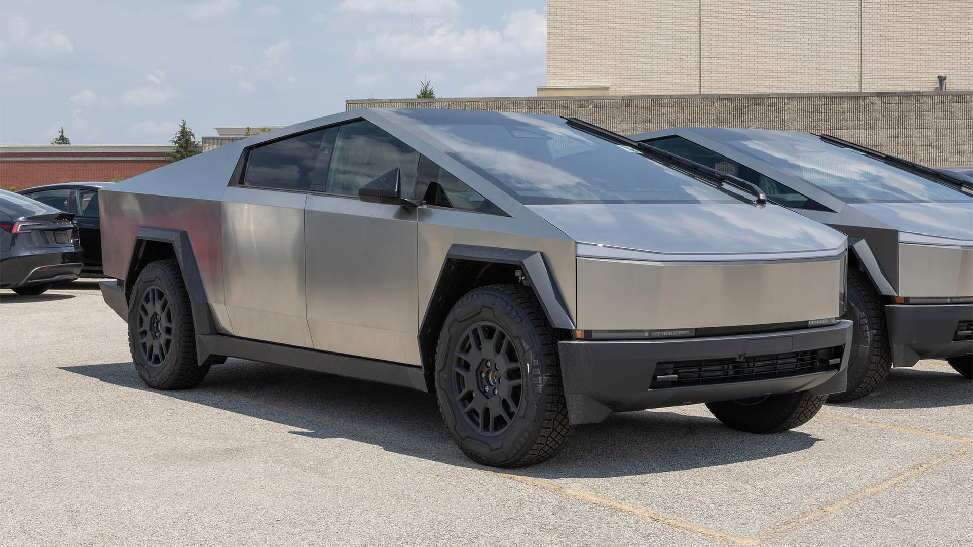 Indianapolis - August 4, 2024: Tesla Cybertruck display at a dealership. Tesla offers the Cybertruck with driving range of up to 340 miles. MY:2024