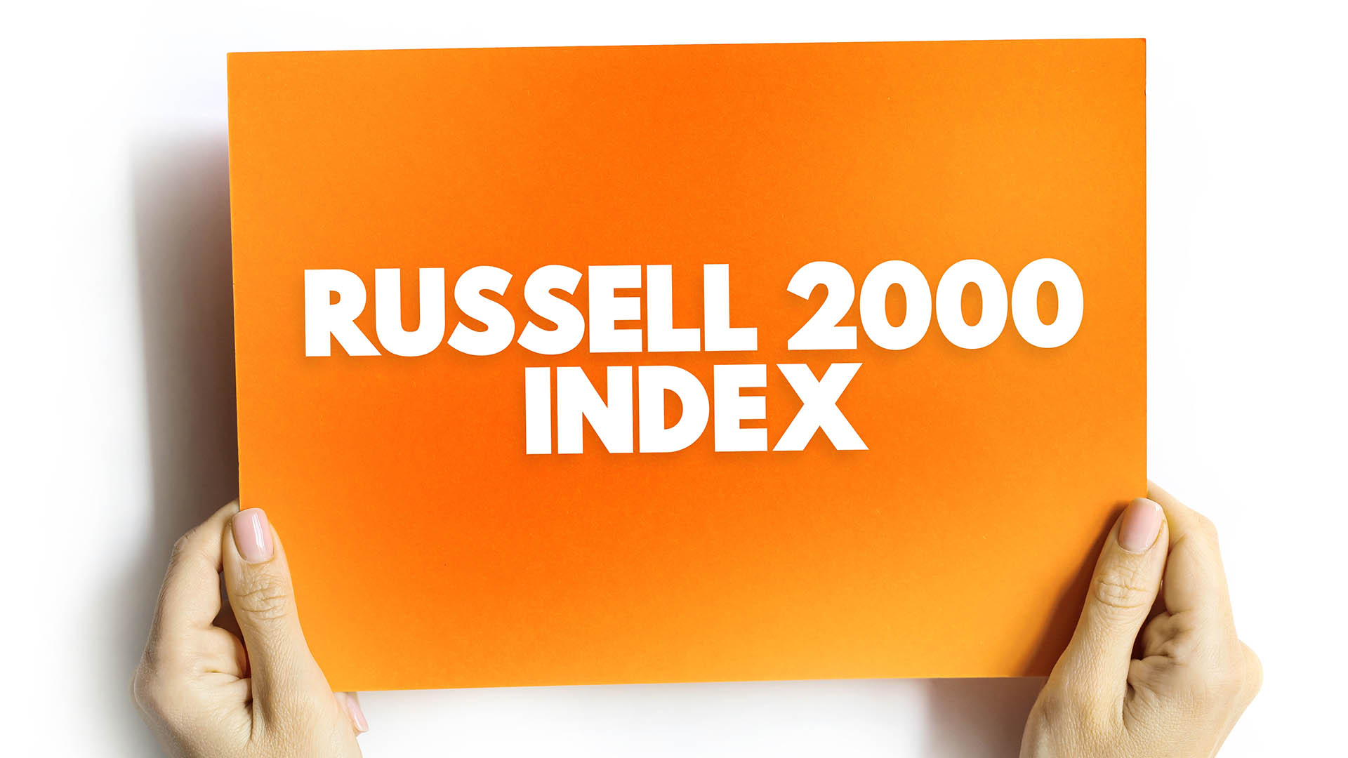 Russell 2000 Index is a market index comprised of 2,000 small-cap companies, text concept on card