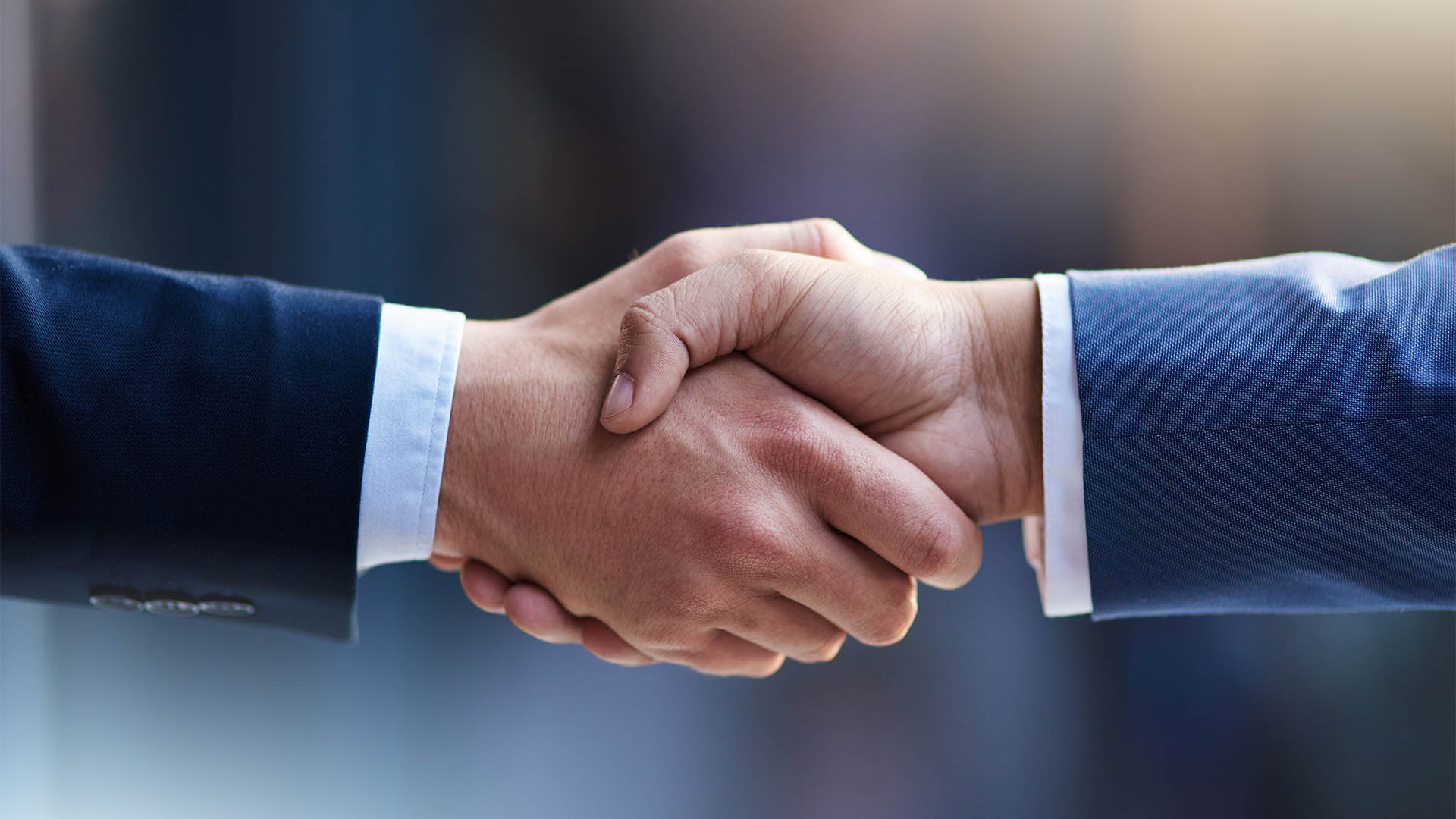 Business, agreement or handshake with zoom for cooperation, welcome or thank you for meeting. Partnership, shaking hands or contact with greeting for b2b or teamwork, collaboration or success